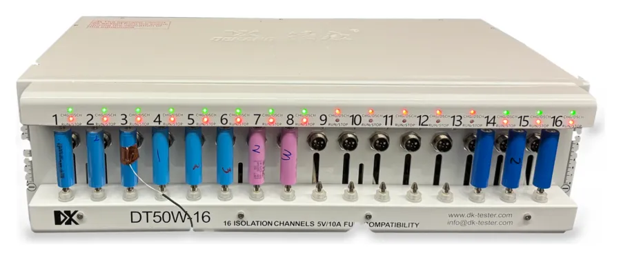The DT50W-16 battery tester with sixteen 18650 cells in its channels, colour-coded by brand, cut out on white