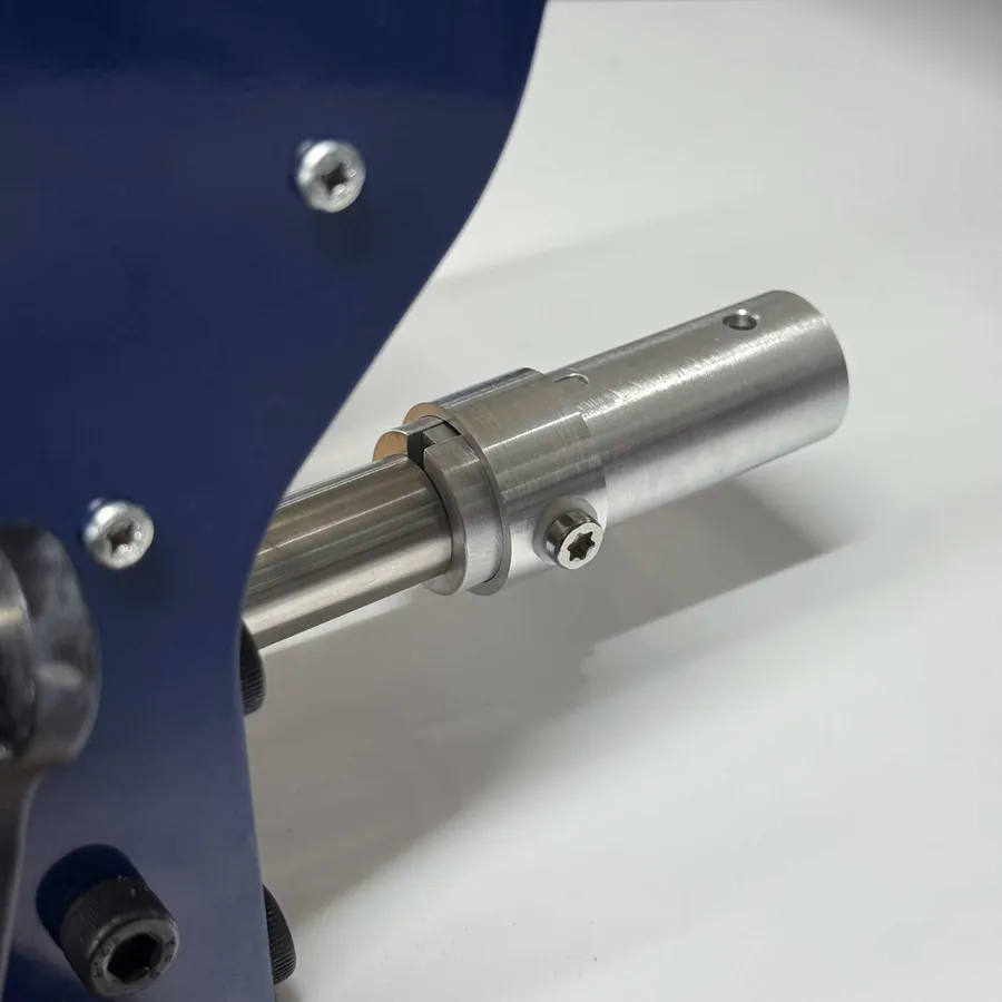 The linkage attached to the shredder's shaft
